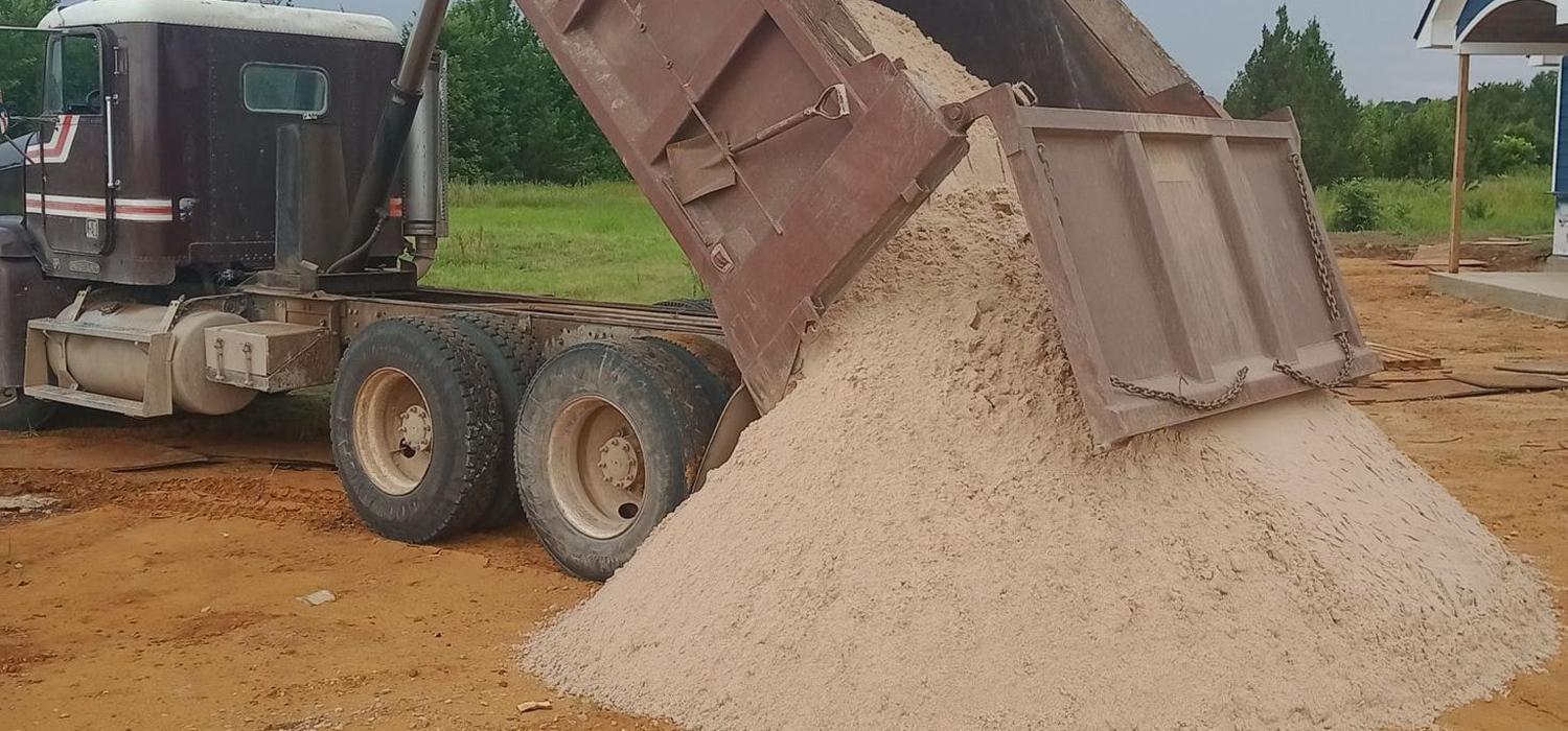 Sand being dumped by truck